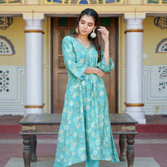 Women Muslin pleated kurta with bead work Neckline & Solid Bottom Set