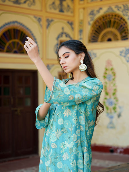 Women Muslin pleated kurta with bead work Neckline & Solid Bottom Set