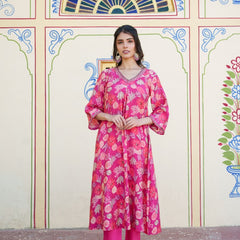Women Muslin pleated kurta with bead work Neckline & Solid Bottom Set