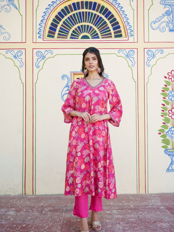 Women Muslin pleated kurta with bead work Neckline & Solid Bottom Set