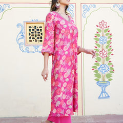 Women Muslin pleated kurta with bead work Neckline & Solid Bottom Set