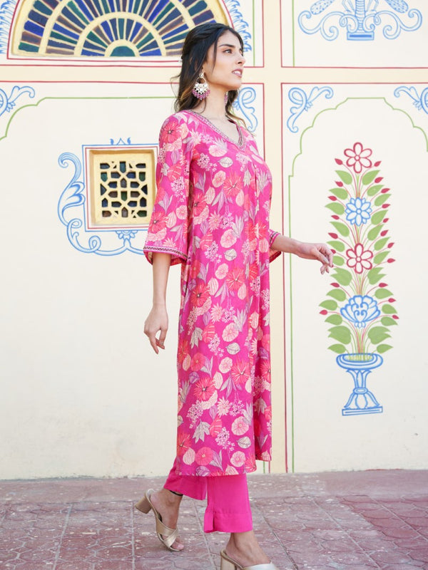 Women Muslin pleated kurta with bead work Neckline & Solid Bottom Set