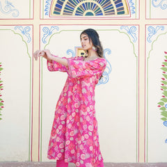 Women Muslin pleated kurta with bead work Neckline & Solid Bottom Set