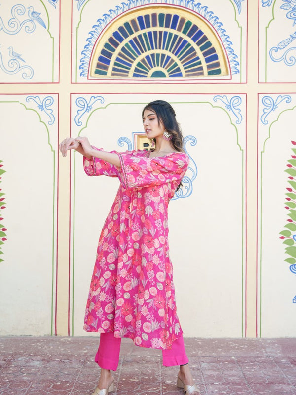 Women Muslin pleated kurta with bead work Neckline & Solid Bottom Set