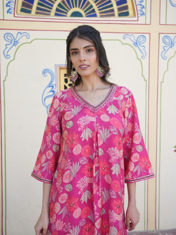 Women Muslin pleated kurta with bead work Neckline & Solid Bottom Set