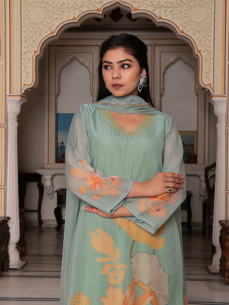 Teal Green Placement print Straight suit set with solid bottom & printed organza cut work dupatta set.