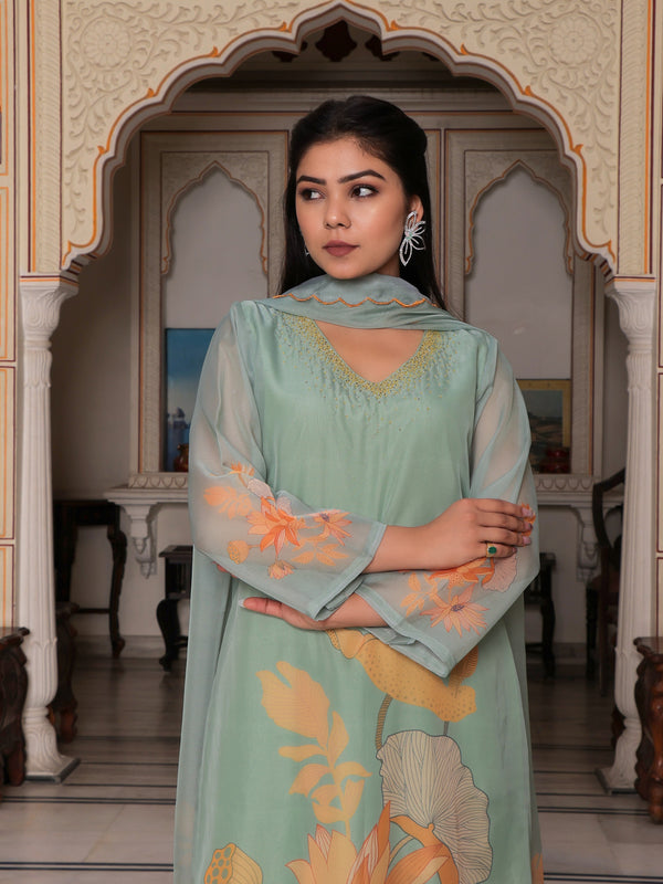 Teal Green Placement print Straight suit set with solid bottom & printed organza cut work dupatta set.