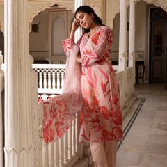Peach Placement print collared Straight suit set with solid bottom & printed organza cut work dupatta set.