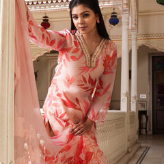 Peach Placement print collared Straight suit set with solid bottom & printed organza cut work dupatta set.