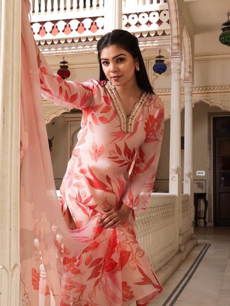 Peach Placement print collared Straight suit set with solid bottom & printed organza cut work dupatta set.