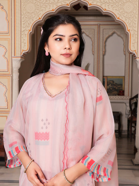 Beige Placement print V neck Straight suit set with solid bottom & printed organza cut work dupatta set.