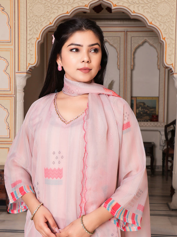 Beige Placement print V neck Straight suit set with solid bottom & printed organza cut work dupatta set.