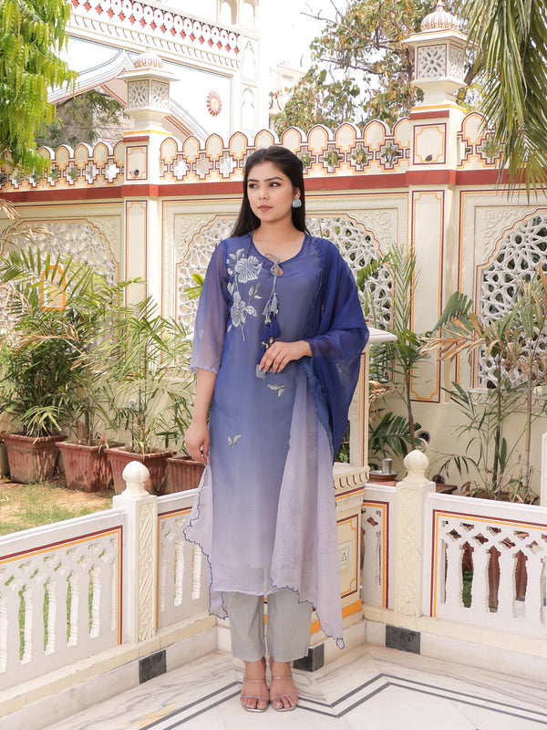 Ombre dual shade Placement print keyhole neckline Straight suit set with solid bottom & printed organza cut work dupatta set.