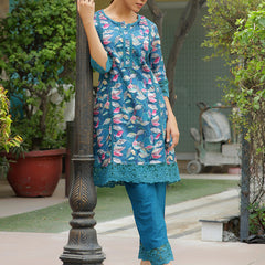 Women cyan embroidered printed  kurta set with laced solid pants