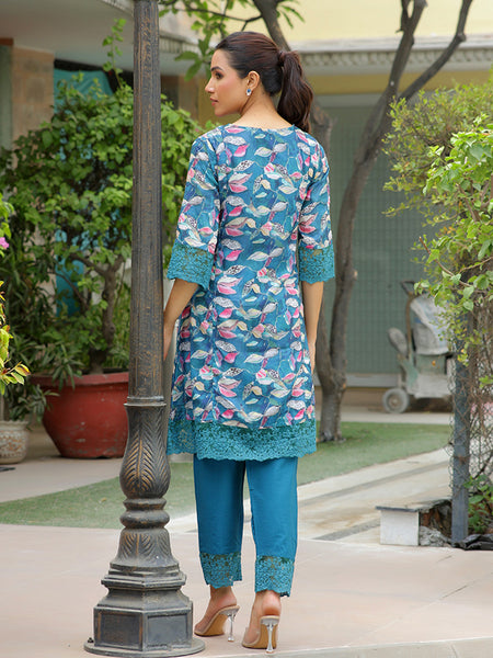Women cyan embroidered printed  kurta set with laced solid pants