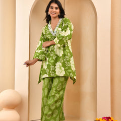 Green floral printed mirror embroidered top with printed bell bottom pants