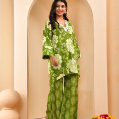 Green floral printed mirror embroidered top with printed bell bottom pants