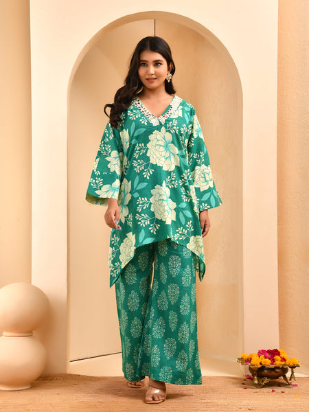 Turquoise floral printed mirror embroidered top with printed bell bottom pants