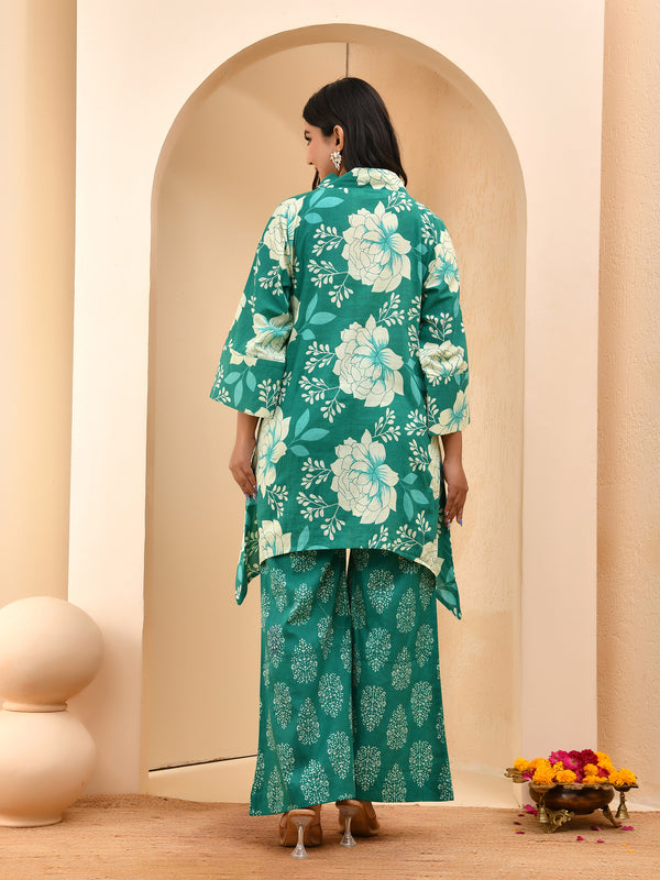 Turquoise floral printed mirror embroidered top with printed bell bottom pants