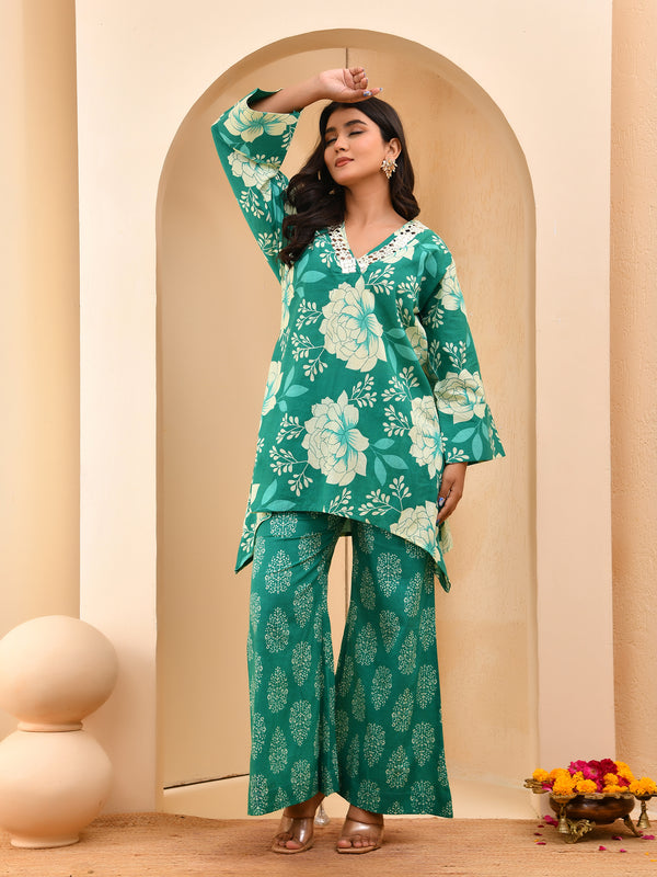 Turquoise floral printed mirror embroidered top with printed bell bottom pants