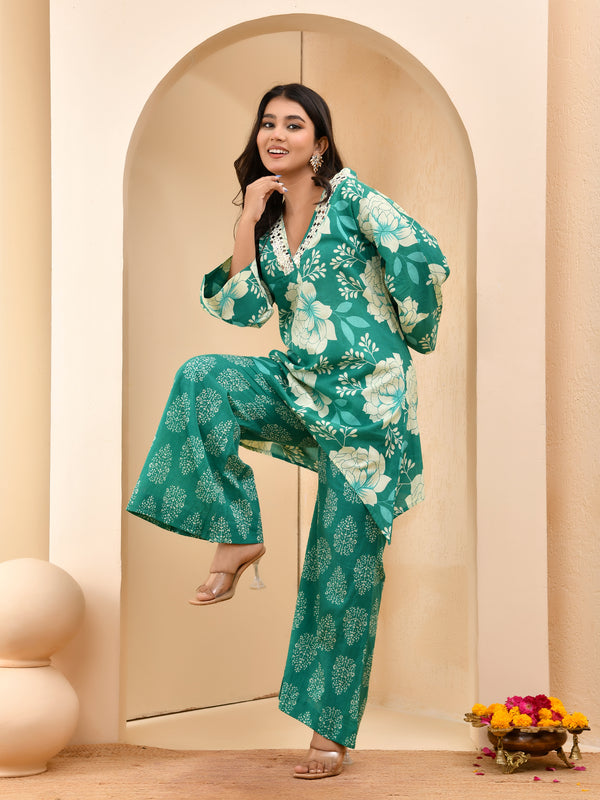 Turquoise floral printed mirror embroidered top with printed bell bottom pants