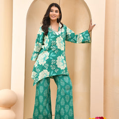 Turquoise floral printed mirror embroidered top with printed bell bottom pants