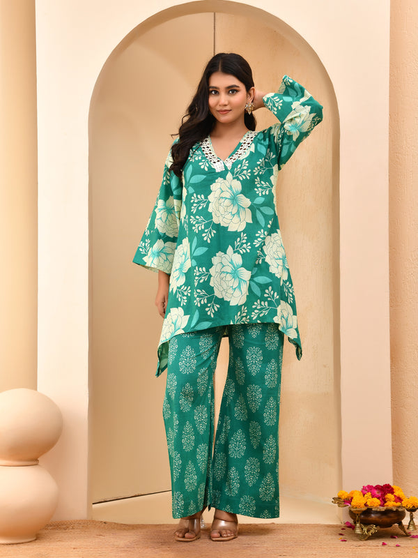 Turquoise floral printed mirror embroidered top with printed bell bottom pants