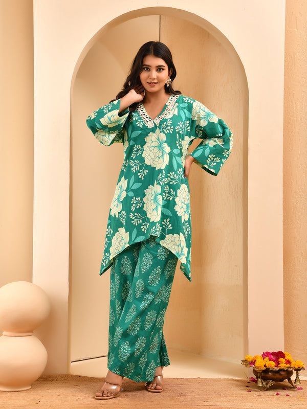 Turquoise floral printed mirror embroidered top with printed bell bottom pants