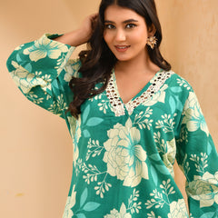 Turquoise floral printed mirror embroidered top with printed bell bottom pants