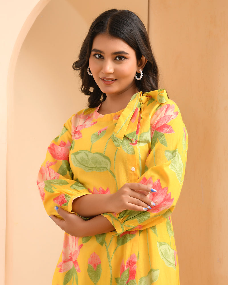 Yellow floral middie dress with shoulder tie-up and gathered panel