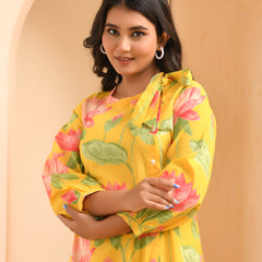 Yellow floral middie dress with shoulder tie-up and gathered panel