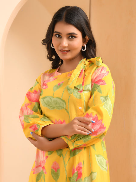 Yellow floral middie dress with shoulder tie-up and gathered panel