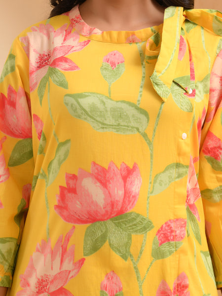 Yellow floral middie dress with shoulder tie-up and gathered panel