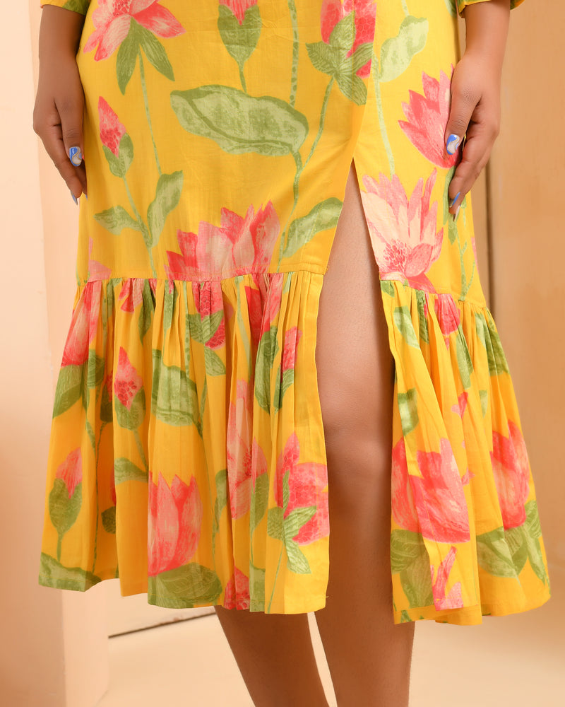 Yellow floral middie dress with shoulder tie-up and gathered panel