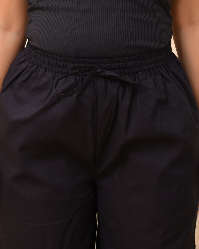 Black solid Palazzo style half elastic draw strings pant