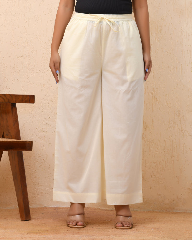 Cream solid flared palazzo pant