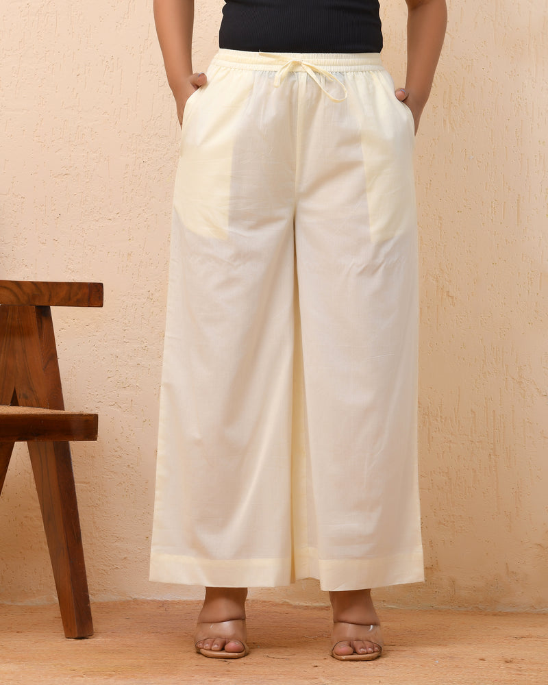 Cream solid flared palazzo pant