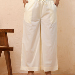 Cream solid flared palazzo pant