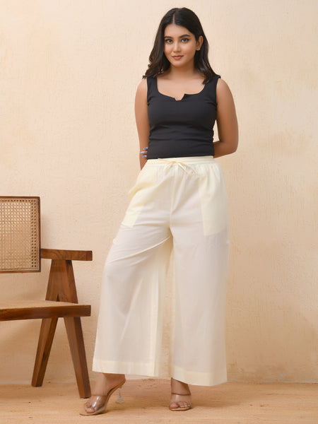Cream solid flared palazzo pant